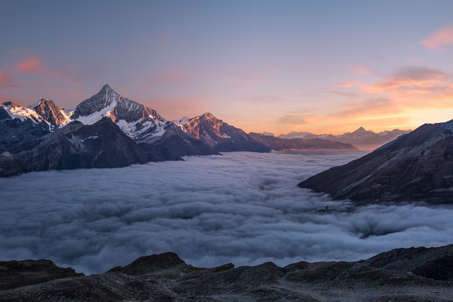 Morning mist over a forested mountain ridge